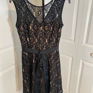 Betsy & Adam black lace with tan under slip.  Belted.
